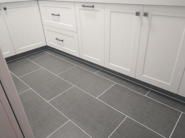 What are the pros and cons of grout 